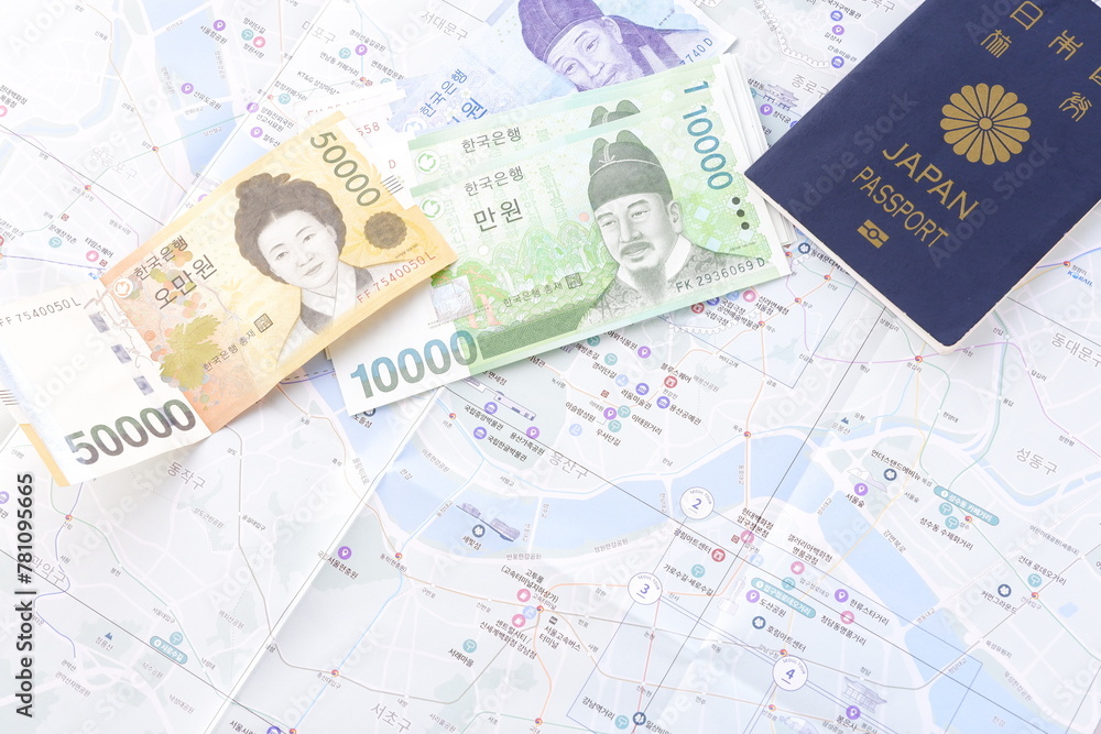 日本のパスポート（一般旅券5年用紺色）と、韓国の通貨ウォンKRWの紙幣を用意して、韓国旅行の計画を立てる

