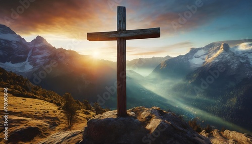 wooden cross at sunrise with mountain landscape crucifixion and resurrection of jesus christ
