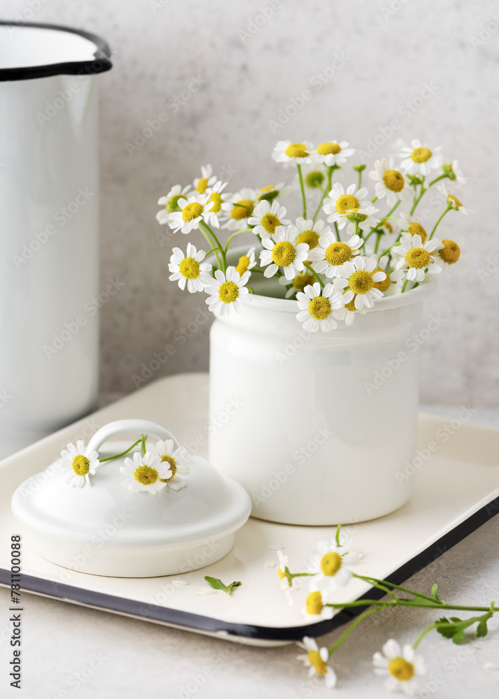 Beautiful bouquet of white wild chamomile herb flowers. Aromatherapy, phytotherapy, alternative medicine, spa and massage concept. (Matricaria chamomilla) Beautiful bouquet of white wild chamomile herb flowers. Aromatherapy, phytotherapy, alternative medicine, spa and massage concept. (Matricaria chamomilla)