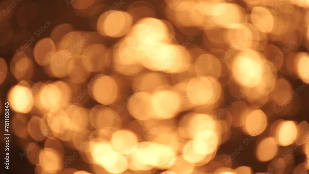 Abstract Blurred video screensaver bokeh golden sea at sunset. The sun reflects and sparkles on the waves. Abstract Blurred video screensaver bokeh golden sea at sunset. The sun reflects and sparkles on the waves.
