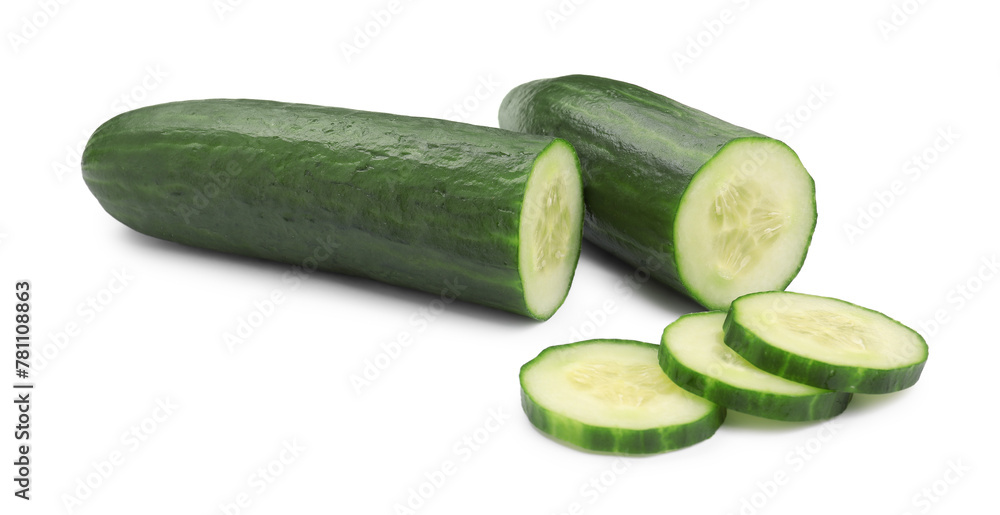 Halves and slices of long cucumber isolated on white Halves and slices of long cucumber isolated on white