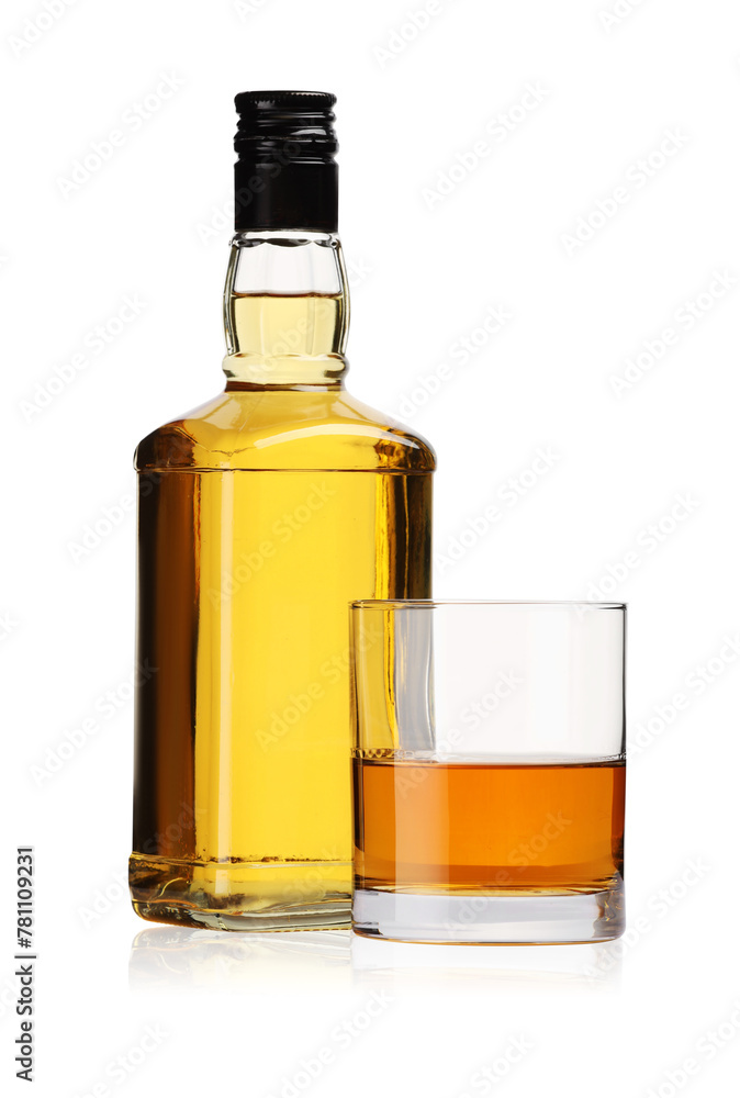 Glass and bottle of whiskey isolated on white Glass and bottle of whiskey isolated on white
