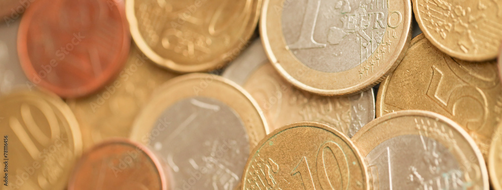 European money euro coins. Shiny coins of European union currency close up European money euro coins. Shiny coins of European union currency close up