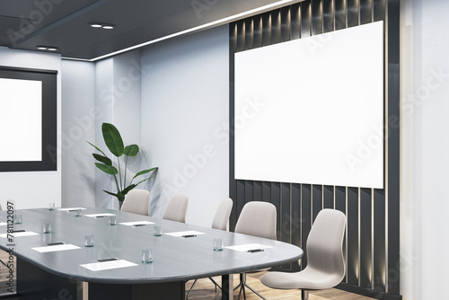 Contemporary wooden and concrete conference room interior with empty white mock up billboard and furniture. Presentation concept. 3D Rendering.