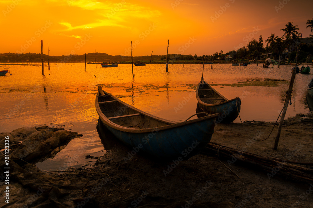 Traditional boats at O Loan lagoon in sunset, Phu Yen province, Vietnam