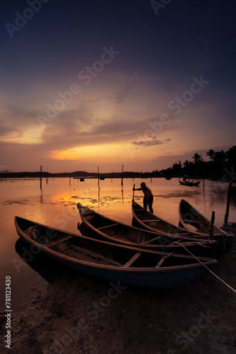 Traditional boats at O Loan lagoon in sunset  Phu Yen province  Vietnam