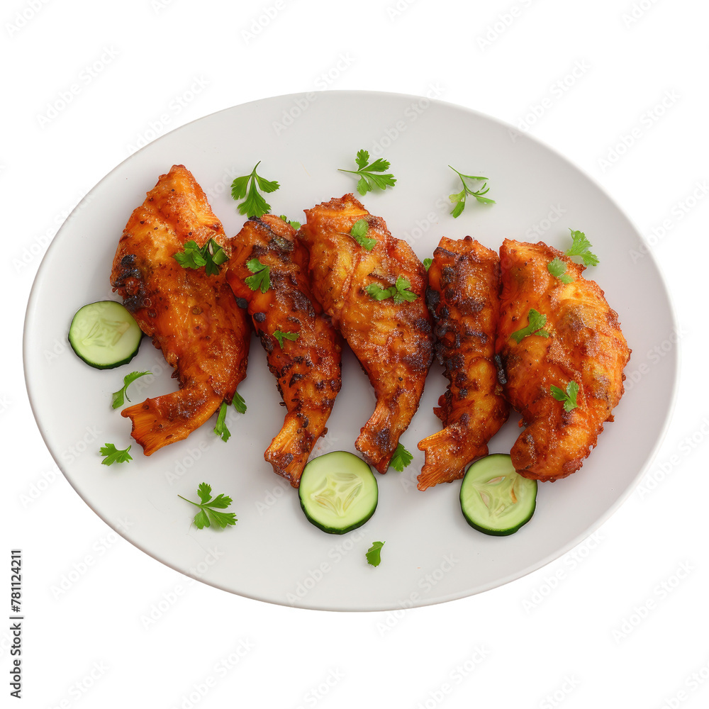 Four chicken pieces on a plate with cucumbers