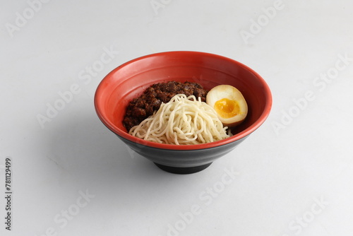 wok fried fu Zhou braised lu rou mee noodle bee hoon with pork ribs minced meat lava braised egg and vegetables in red bowl on white table asian restaurant banquet cafe cuisine halal food menu photo