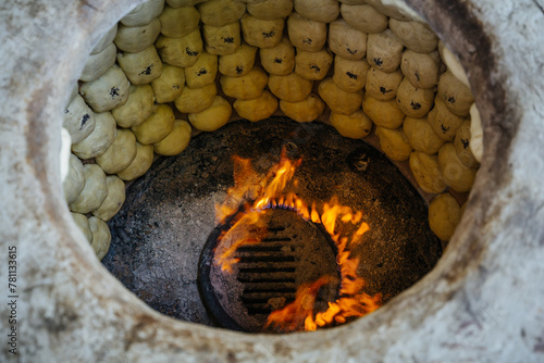 Baking samosa in tandoor photo