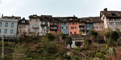 Colorfull Houserow with beautiful steep garden