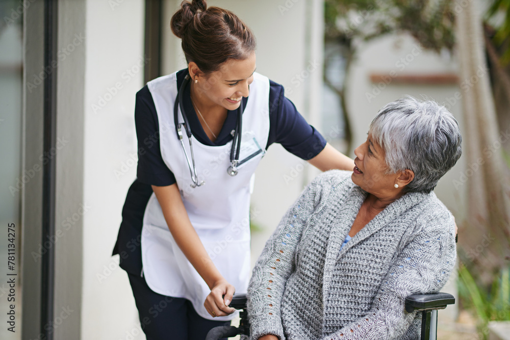 Fototapeta premium Senior woman and wheelchair at nursing home with carer for assistance in closeup, help at clinic. Disabled retiree and medical or outdoors for talk or plan for healthcare, conversation with nurse