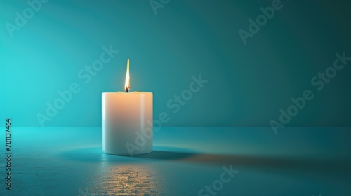 Burning candle on a blue background. Banner with copy space.