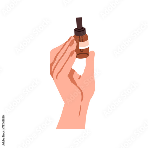 Dropper bottle in hand. Holding serum, cosmetic oil. Beauty product, moisturi...