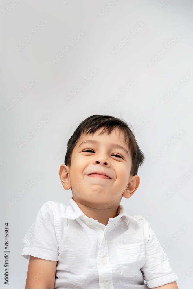 Portrait of a smiling boy on a white background
Portrait of a smiling boy on a white background