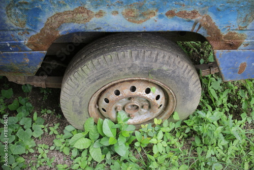 Closeup of Damaged and Flat Car Tires