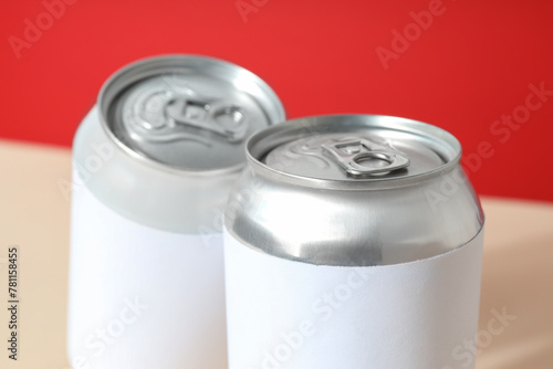 Tin cans for drinks on a light background