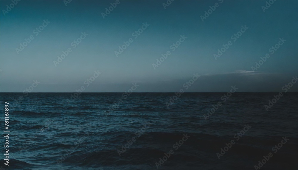 dark and blue open sea with blue sky