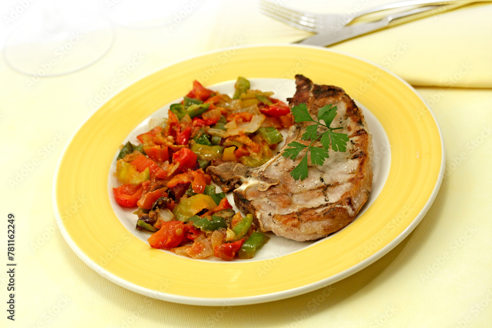 Pork chop with vegetables. Pork chop with vegetables.