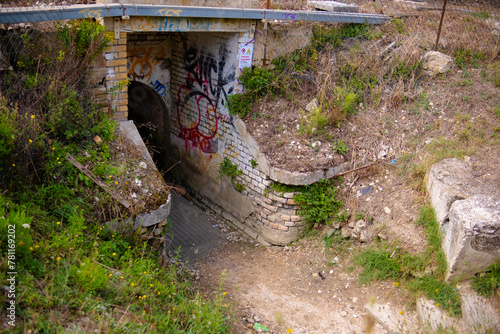 A terrible, dilapidated entrance to an underground passage
