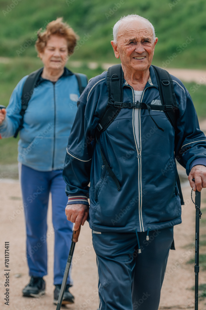 senior couple hiking outdoors in nature senior couple hiking outdoors in nature