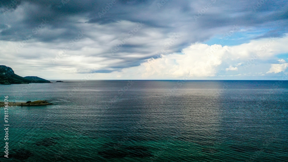 Scenic view of blue cloudy sky over peaceful seascape