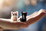 AI generated illustration of adorable kittens sitting on a palm of a hand