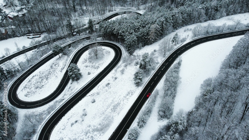 Aerial view of the curvy road in winter.