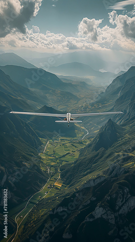 A glider being released from its tow plane, silently soaring over a scenic valley, emphasizing the beauty of silent flight