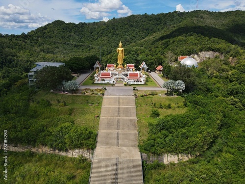 Drone shot of the Buddha Statue in Kat Yai Park of Songkhla Province, Thailand photo
