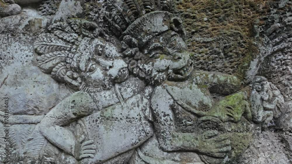 Relief stone carving of Monkeys in the Monkey Forest, Ubud, Bali, Indonesia. Relief stone carving of Monkeys in the Monkey Forest, Ubud, Bali, Indonesia.