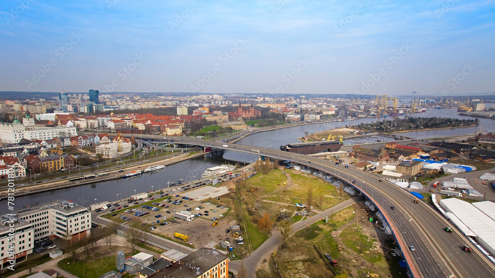 Fototapeta premium March panorama of Szczecin taken by drone, featuring the city's architecture and the Oder.