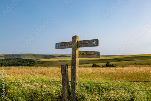 A directional sign post in the South Downs on a sunny summer's day