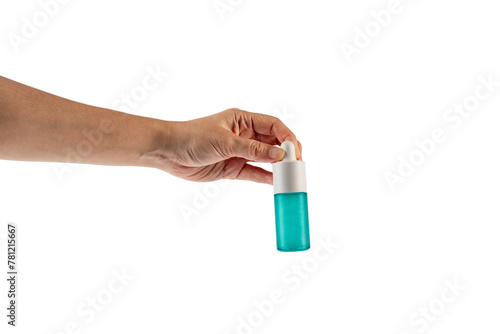 Blue glass cosmetic bottle in hand, Skin care or sunscreen cosmetic on transparent background.