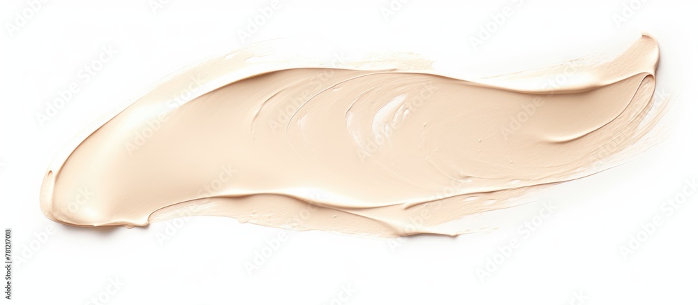 Cream liquid foundation close-up on white surface Cream liquid foundation close-up on white surface