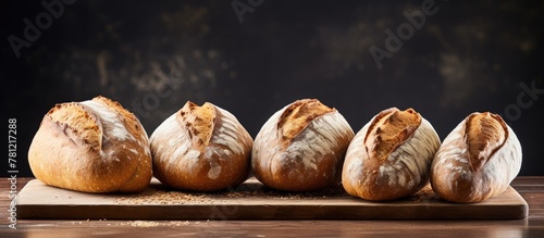 Loaf of bread on wooden chopping board