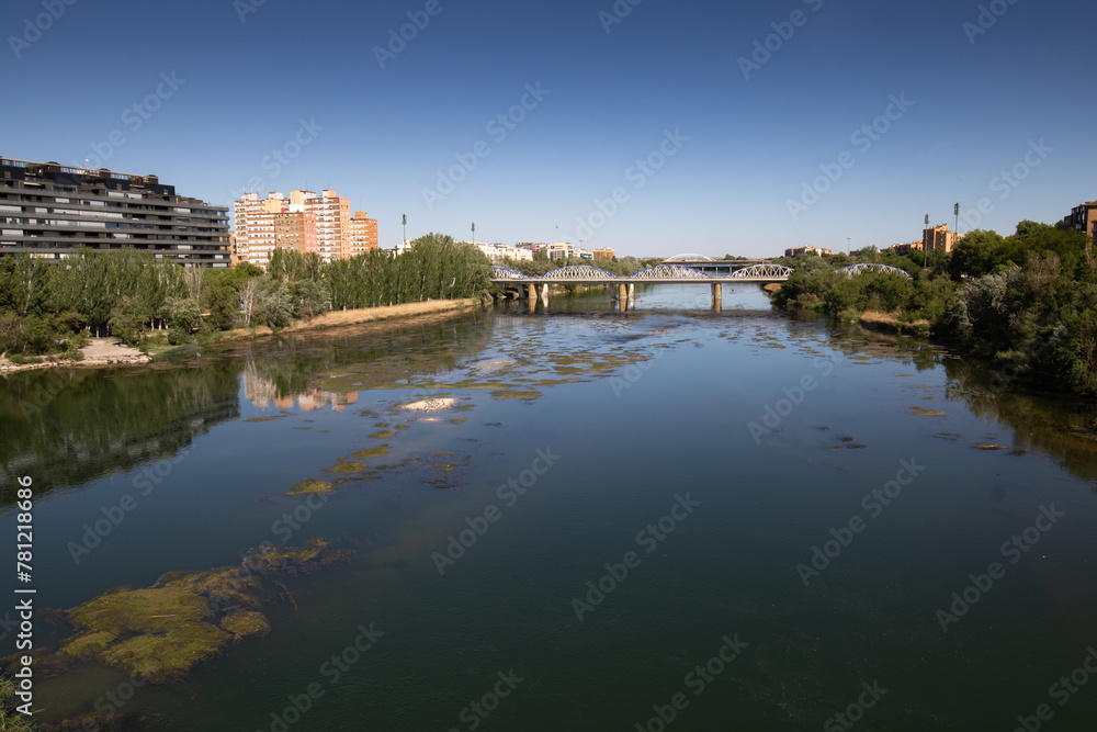 view on ebro river flowing in Zaragoza, Spain