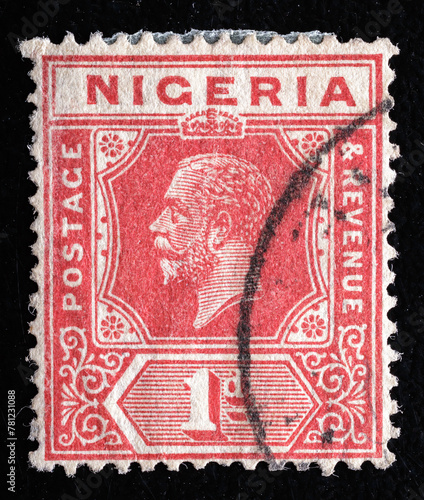 Ukraine, Kiyiv - February 3, 2024.Postage stamps from Nigeria.A Stamp printed in Australia shows George V King of the United Kingdom, circa 1921