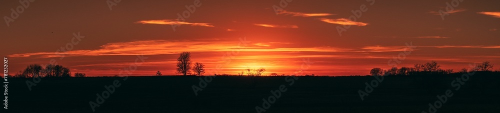 Panoramic landscape of sunset on the farm