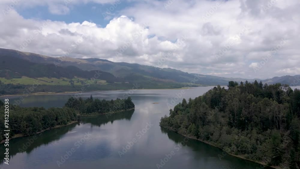 Drone shot of Colombian forests in the town of Neusa with a lake and mountain Drone shot of Colombian forests in the town of Neusa with a lake and mountain