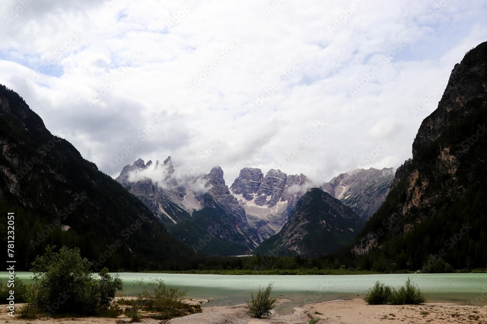 Beautiful shot of a lake with a mountainous landscape in the background