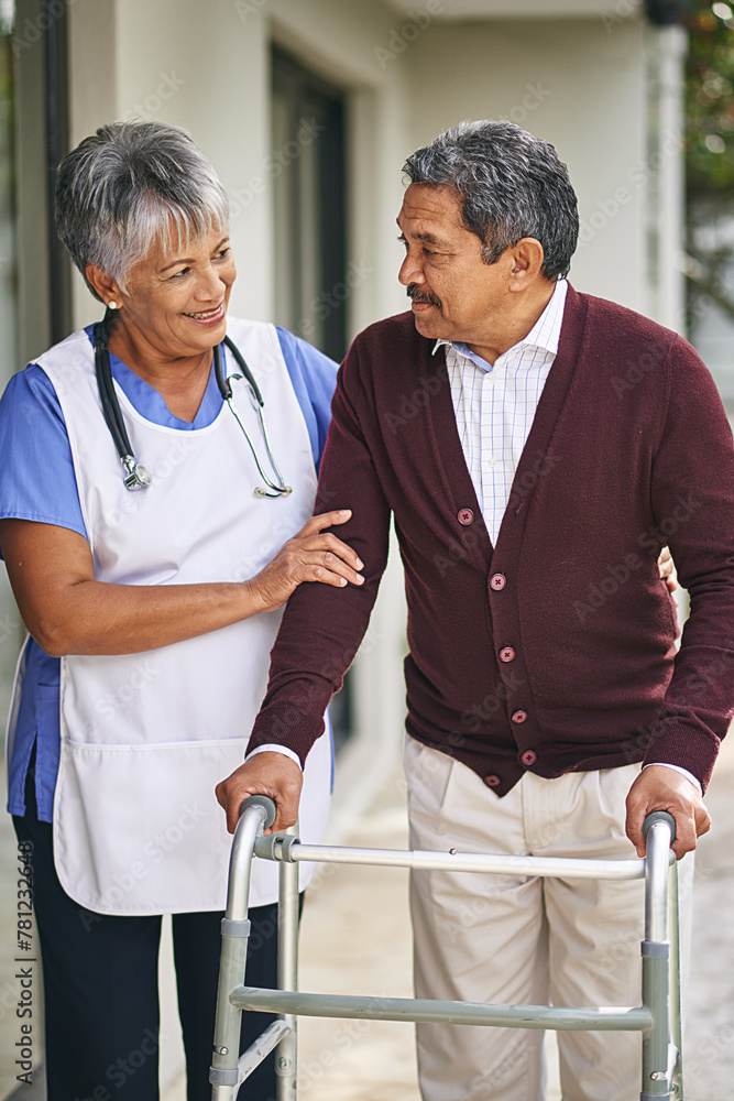 Fototapeta premium Nurse, person with disability and walker with talking at retirement home or outside, care and stethoscope. Disabled retiree and medical or outdoors for support or plan, healthcare or conversation