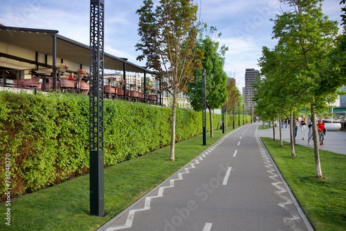 Wallpaper Mural asphalt bike path in the park. landscaped area for walking. Torontodigital.ca
