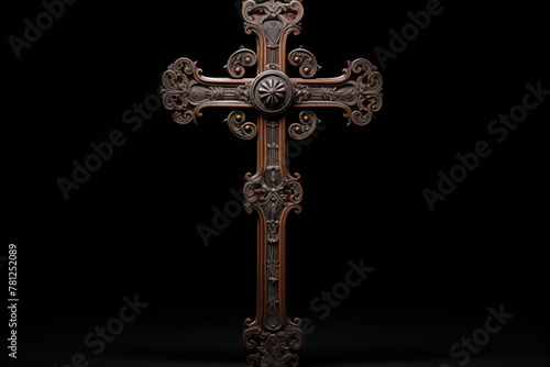 Christian religious metal cross on black background. Christian religious crucifix on black background. Topics related to the Christian religion. Topics related to death. Object of worship and belief.