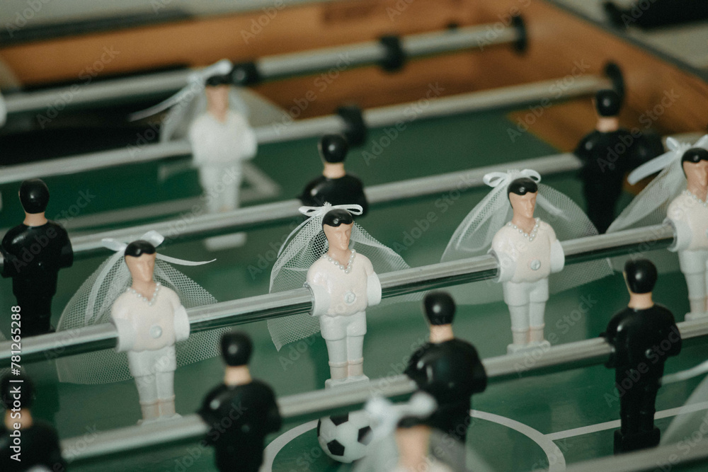 Table football decorated for wedding celebration, game for wedding buffet Table football decorated for wedding celebration, game for wedding buffet