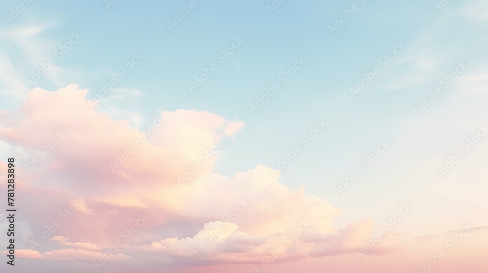 Gentle pink clouds float in a calm sky, creating a tranquil scene as the sun sets, offering a sense of peace and contemplation