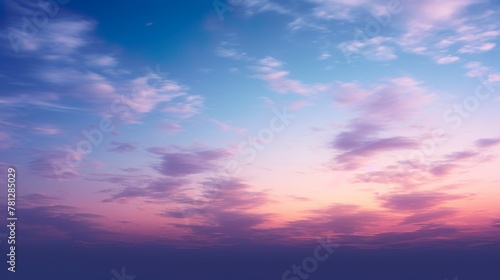A calming display of fluffy clouds adorned with soft pink and purple hues © Damerfie