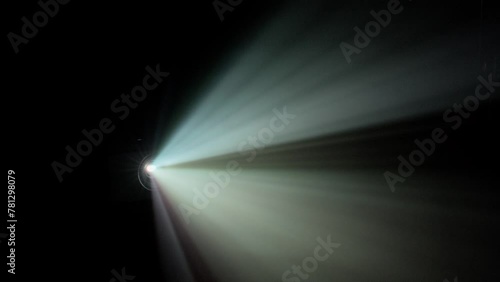 Digital Video Projector Lights Breaking Through The Dark