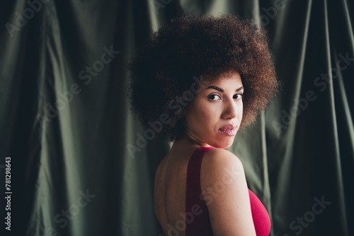 Photo no filter of lady with curls hairdo look isolated studio linen green color background