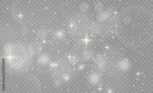 Star dust sparks in an explosion. White sparks glitter special light effect. White glitter texture Christmas background. Sparkling magical dust particles.
