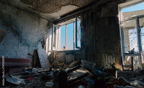 destroyed and burned houses in the city in Ukraine © Sofiia